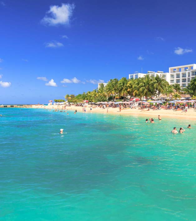 view of beach from distance with resort