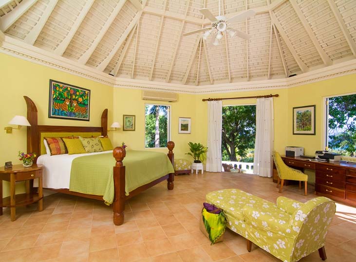 Interior view of master bedroom and door to balcony